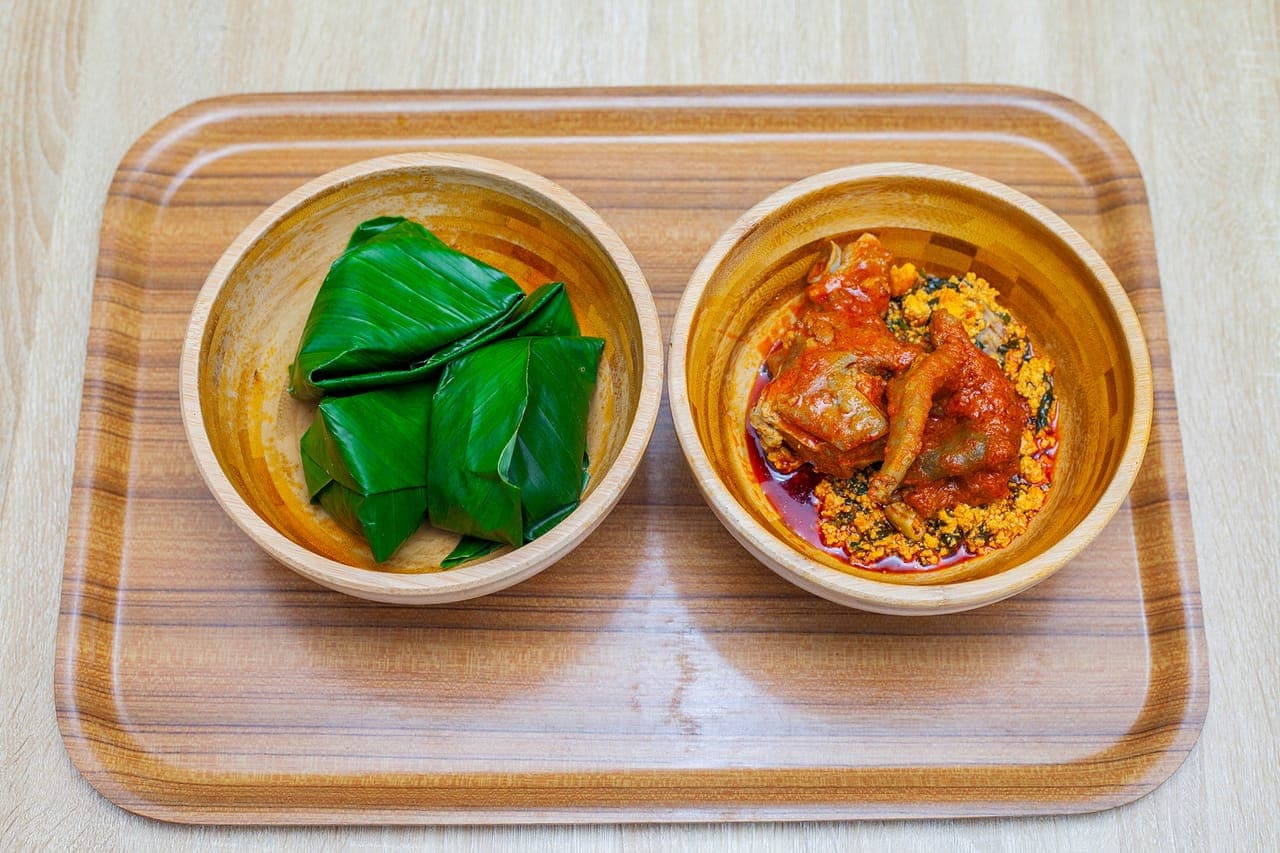 2 WRAPS IYAN WITH EGUSI AND 1 GOATMEAT